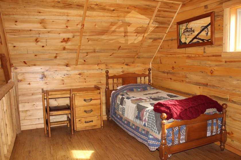 Located in the heart of the Northwoods on Moen Lake, this - photo 9