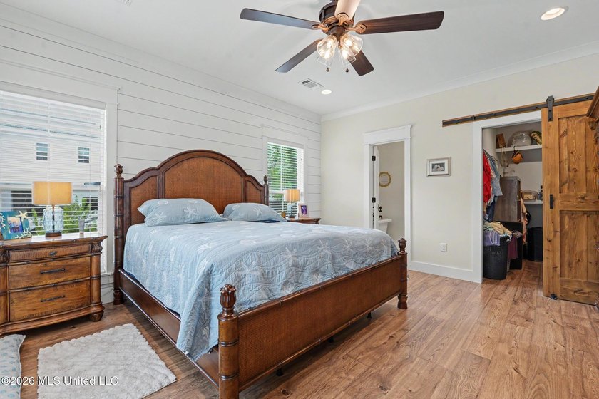 Nestled amongst majestic Live Oaks on one of Waveland's most - photo 12
