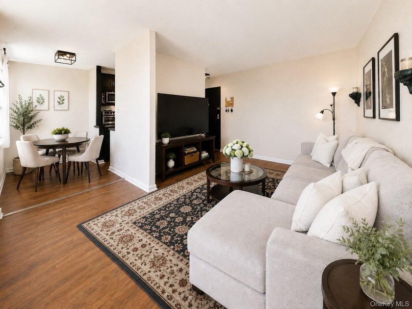 Welcome home to this bright and inviting top-floor one-bedroom - photo 3