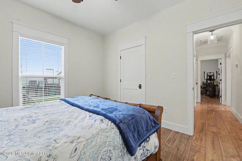 Nestled amongst majestic Live Oaks on one of Waveland's most - photo 18