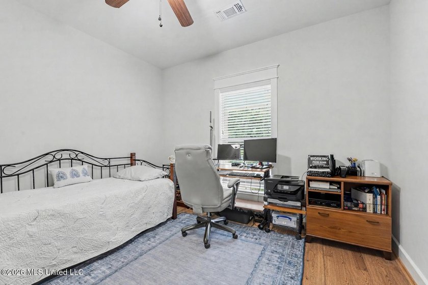 Nestled amongst majestic Live Oaks on one of Waveland's most - photo 19