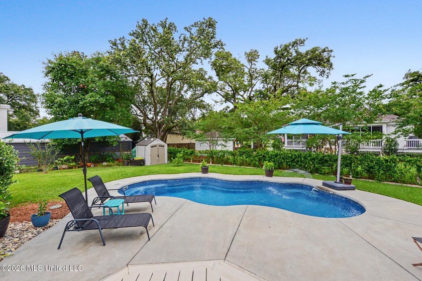 Nestled amongst majestic Live Oaks on one of Waveland's most - photo 26