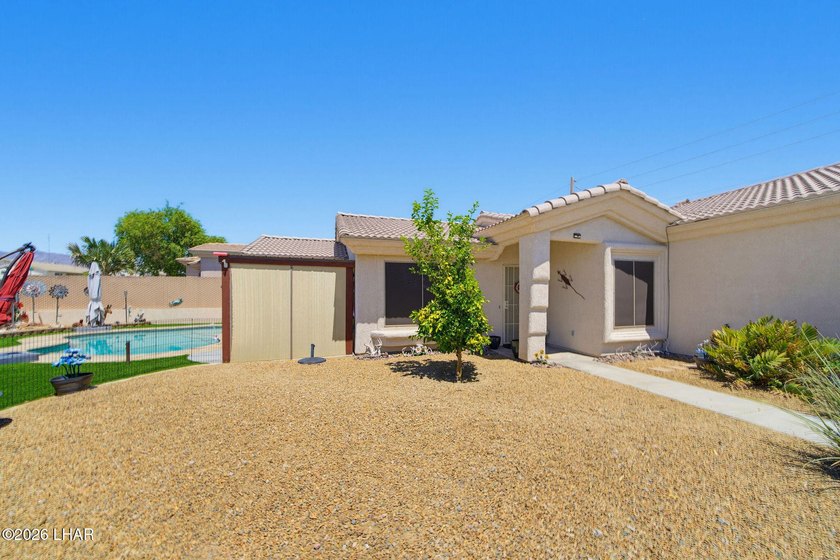 Discover this stunning 3-bedroom, 3-bathroom pool home perfectly - photo 13