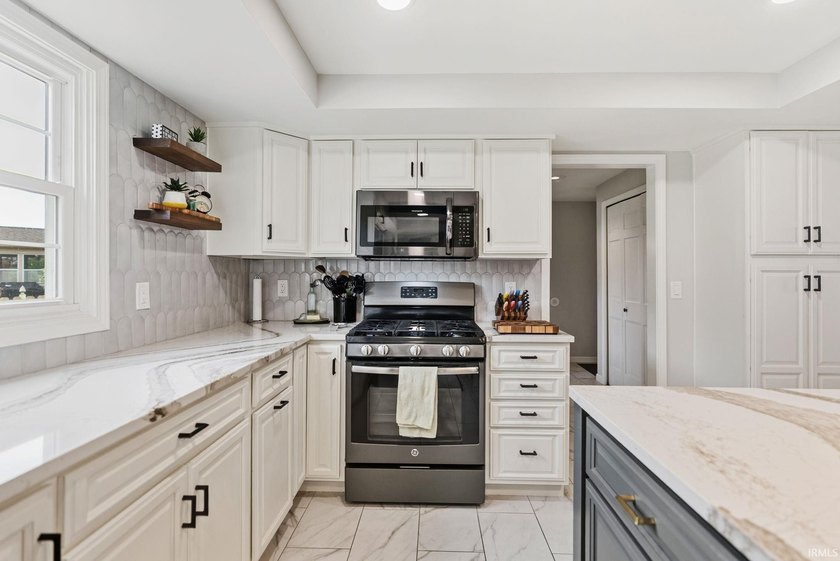 Welcome to Pine Valley! This 4-bedroom, 2.5-bath home offers the - photo 11