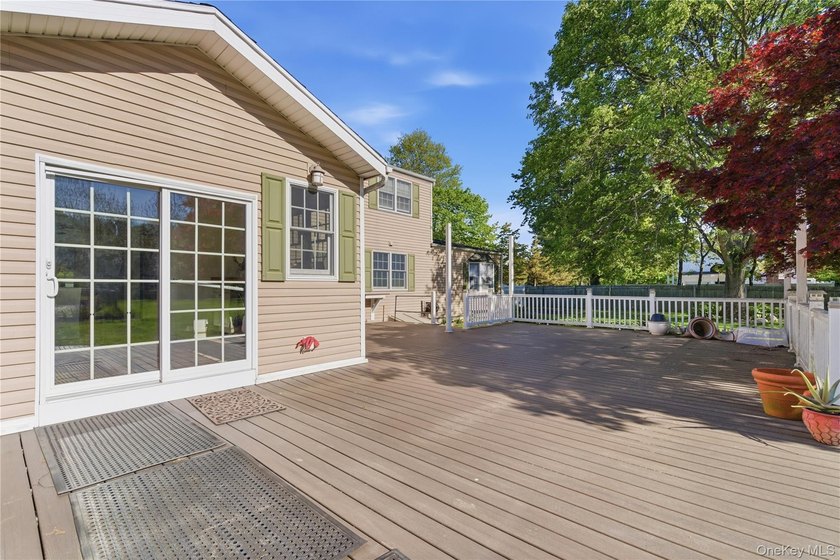 Move right into this custom Expanded Cape set on just over an - photo 31