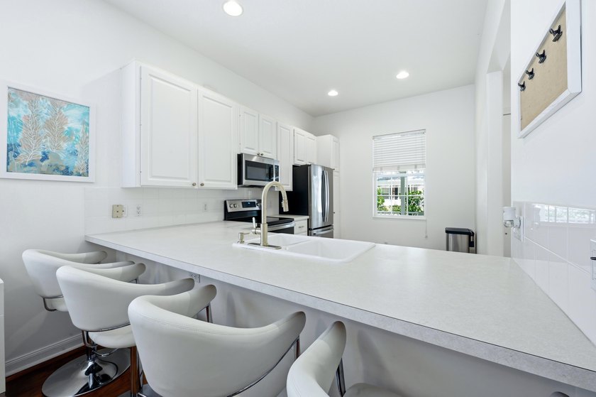Welcome to New Haven at Abacoa, where timeless charm meets - photo 12