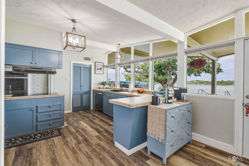 Experience the best of Lake living in this beautifully updated - photo 16