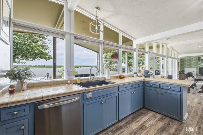 Experience the best of Lake living in this beautifully updated - photo 18