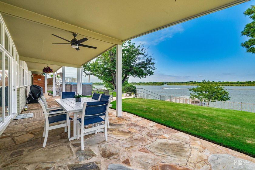 Experience the best of Lake living in this beautifully updated - photo 34