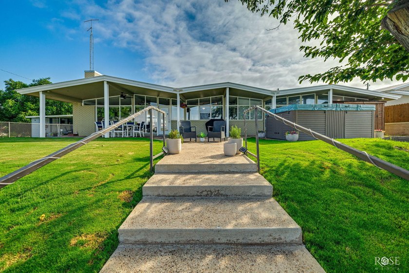 Experience the best of Lake living in this beautifully updated - photo 44