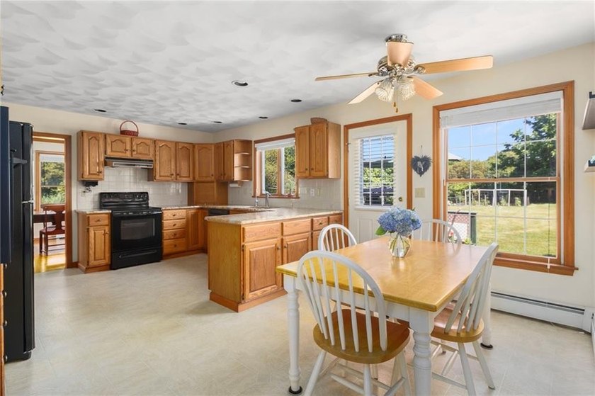 Nestled on a beautifully maintained corner lot in one of - photo 6