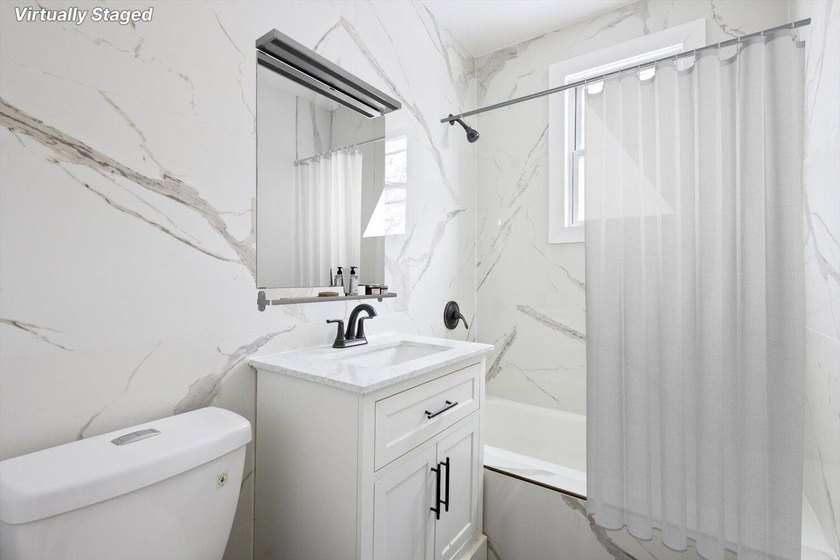 JUST LISTED MOVE-IN READY SUNNY SOUTH-FACING 2-FAMILY TOWNHOUSE - photo 11