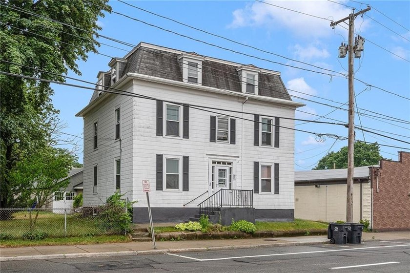 Excellent opportunity to own a well-maintained three-family - photo 3
