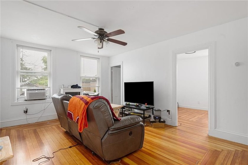 Excellent opportunity to own a well-maintained three-family - photo 8