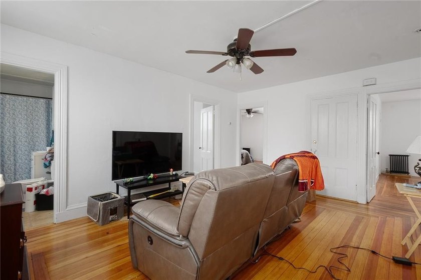 Excellent opportunity to own a well-maintained three-family - photo 9