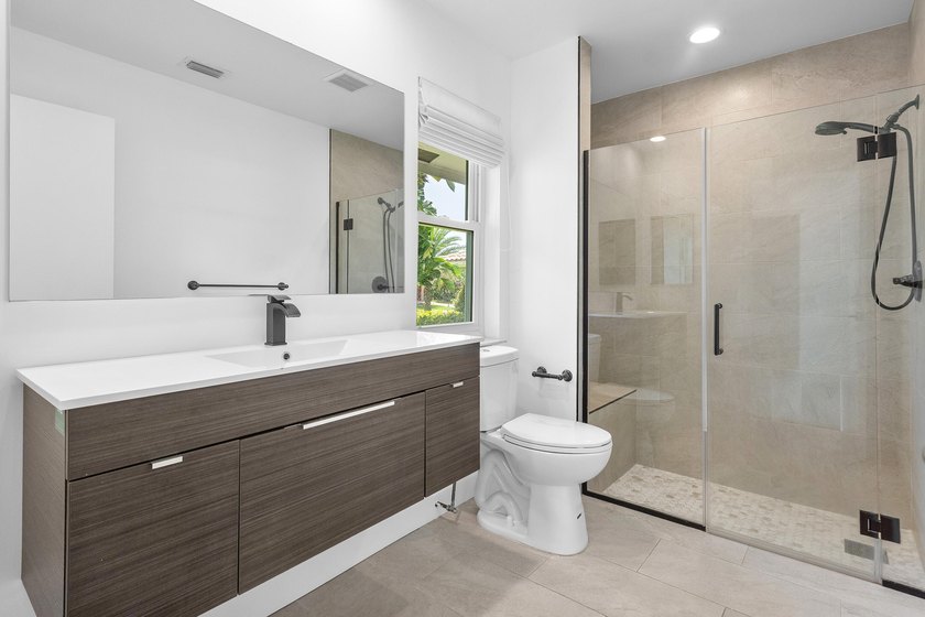 Located in the prestigious Seagate Country Club, this - photo 27