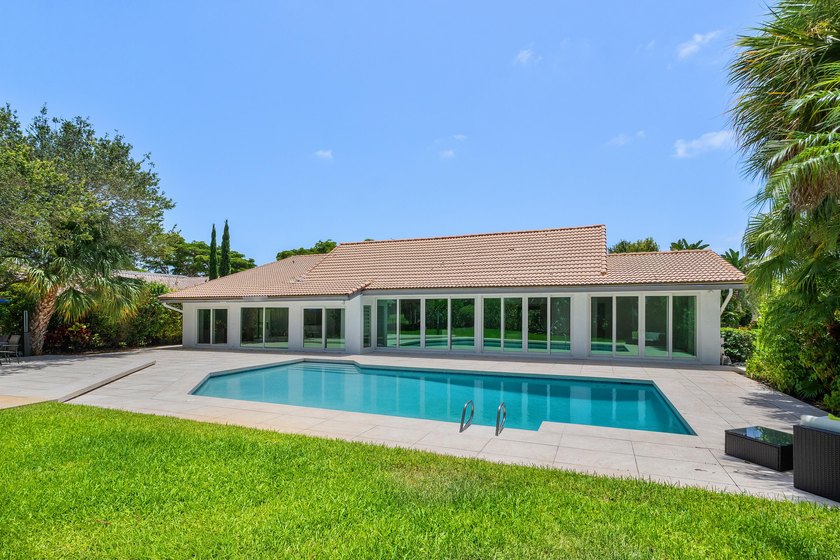 Located in the prestigious Seagate Country Club, this - photo 30
