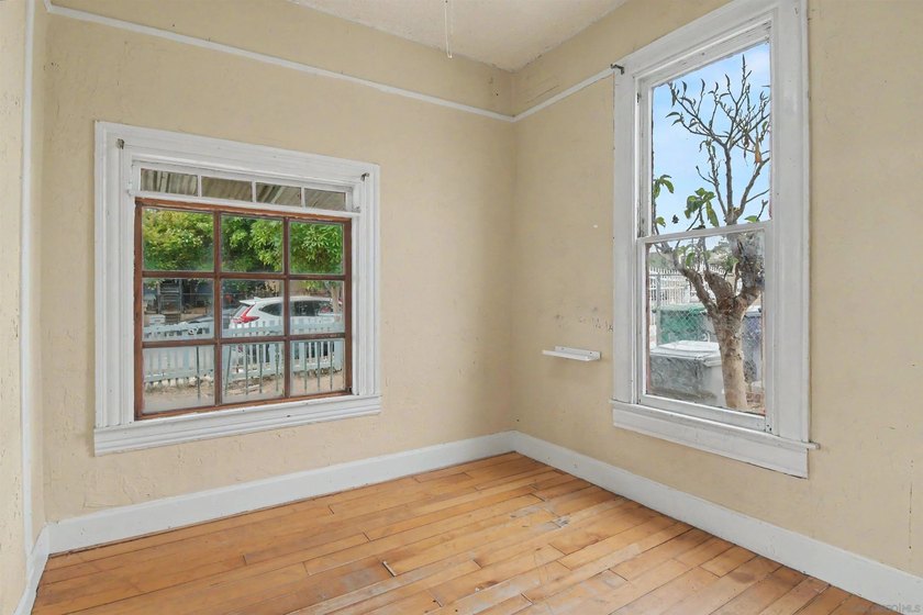 * FIXER * Large, 7,000+ sq. ft. corner lot with paved concrete - photo 9