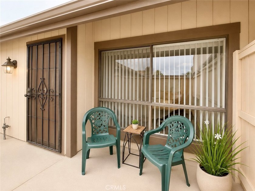 This 2-story condo offers comfortable living in the gated Coral - photo 3