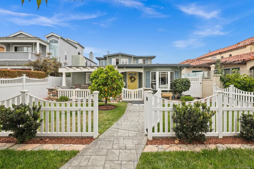 Set on a quiet street just five blocks from the beach, this 3 - photo 3