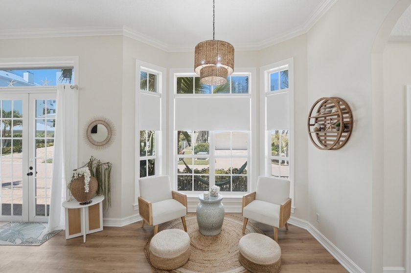 Located in the gated Jupiter Key community just steps from the - photo 11