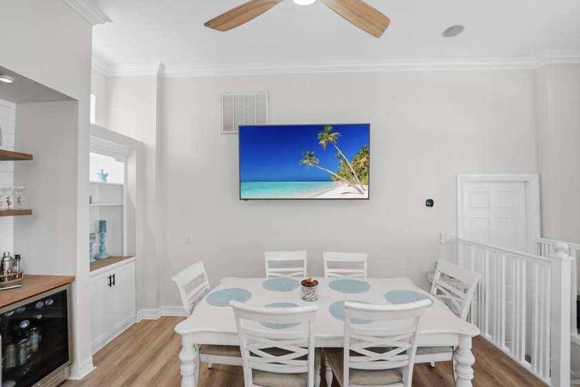 Located in the gated Jupiter Key community just steps from the - photo 12