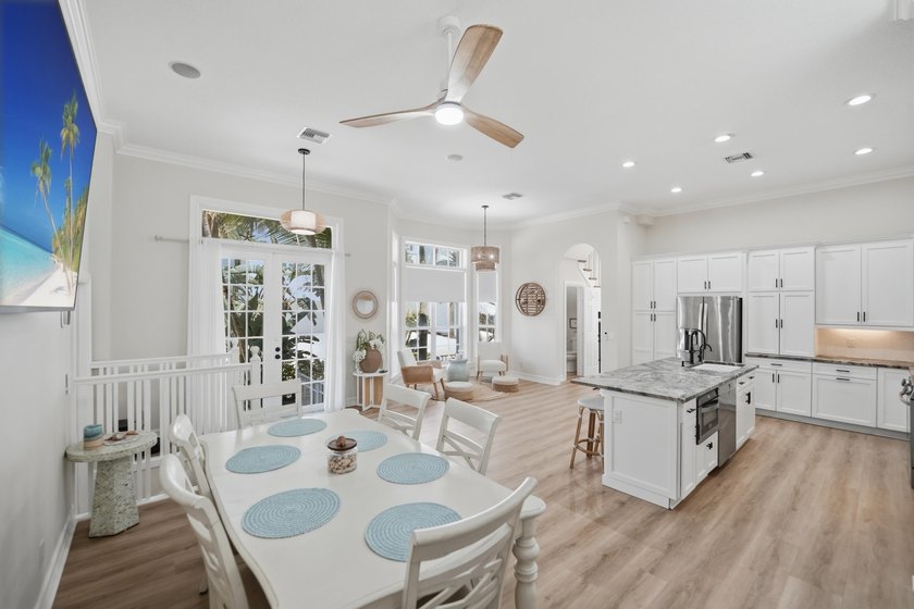 Located in the gated Jupiter Key community just steps from the - photo 18