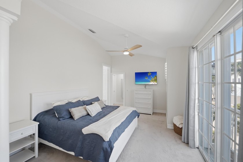 Located in the gated Jupiter Key community just steps from the - photo 22