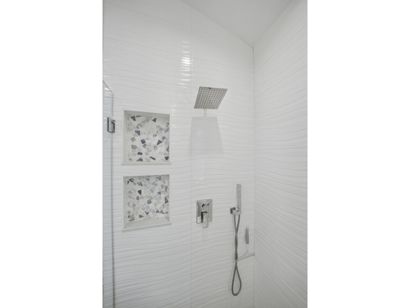 Located in the gated Jupiter Key community just steps from the - photo 29