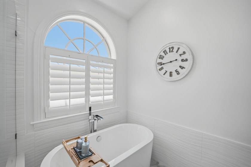 Located in the gated Jupiter Key community just steps from the - photo 30