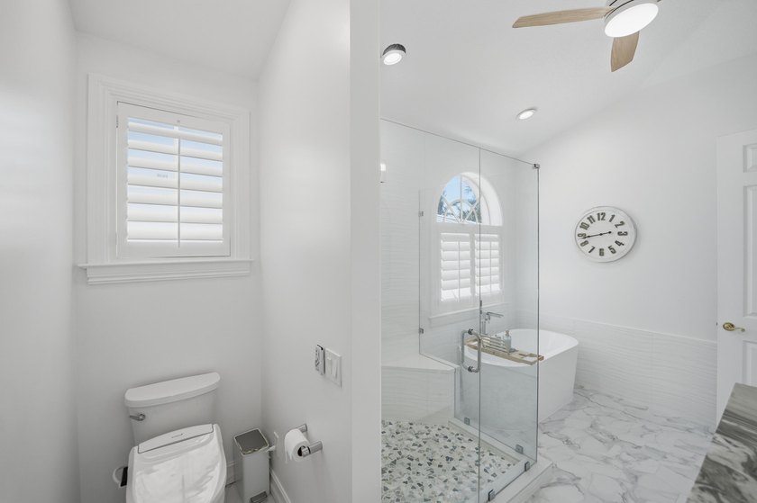 Located in the gated Jupiter Key community just steps from the - photo 32