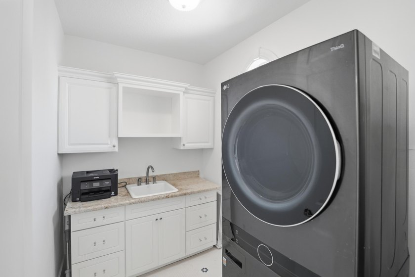 Located in the gated Jupiter Key community just steps from the - photo 42