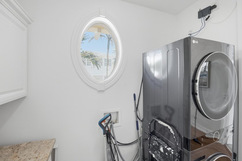 Located in the gated Jupiter Key community just steps from the - photo 43
