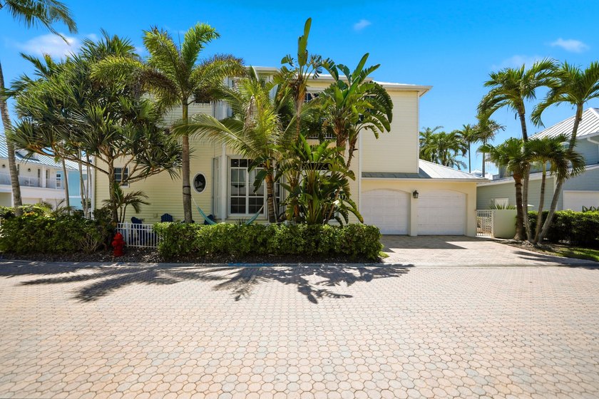 Located in the gated Jupiter Key community just steps from the - photo 44