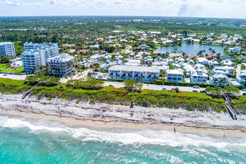 Located in the gated Jupiter Key community just steps from the - photo 55