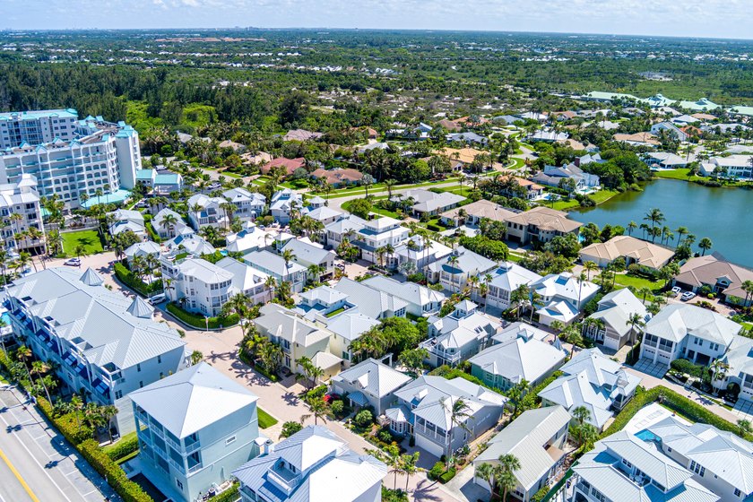 Located in the gated Jupiter Key community just steps from the - photo 57