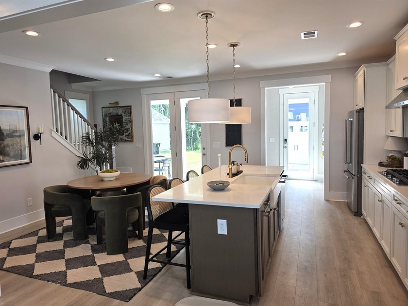 Welcome to this stunning Craftsman-inspired home in the highly - photo 6