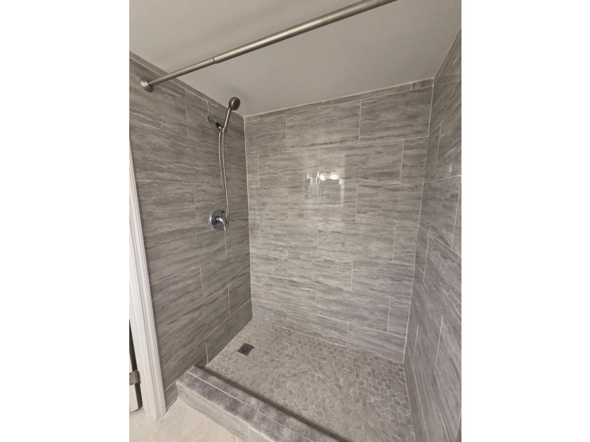 PRICE, LOCATION &amp; STYLE! Beautifully updated 55+ 1/1 condo - photo 12