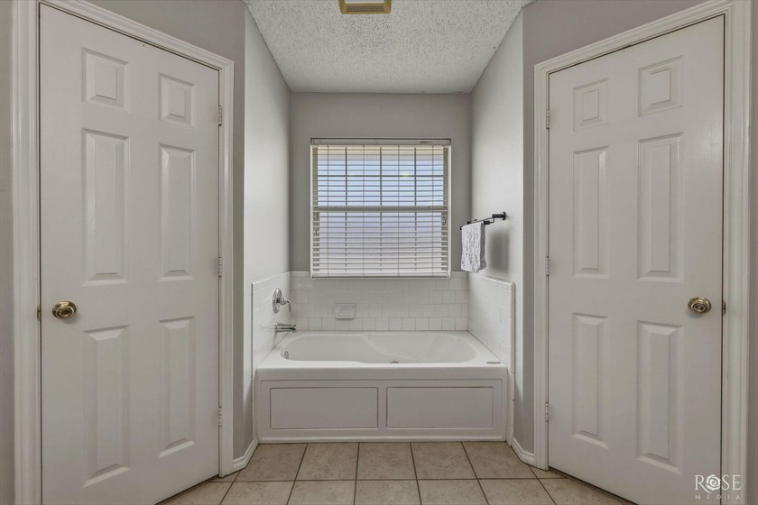 Welcome home to this well-priced 3 bedroom, 2 bath gem in - photo 15