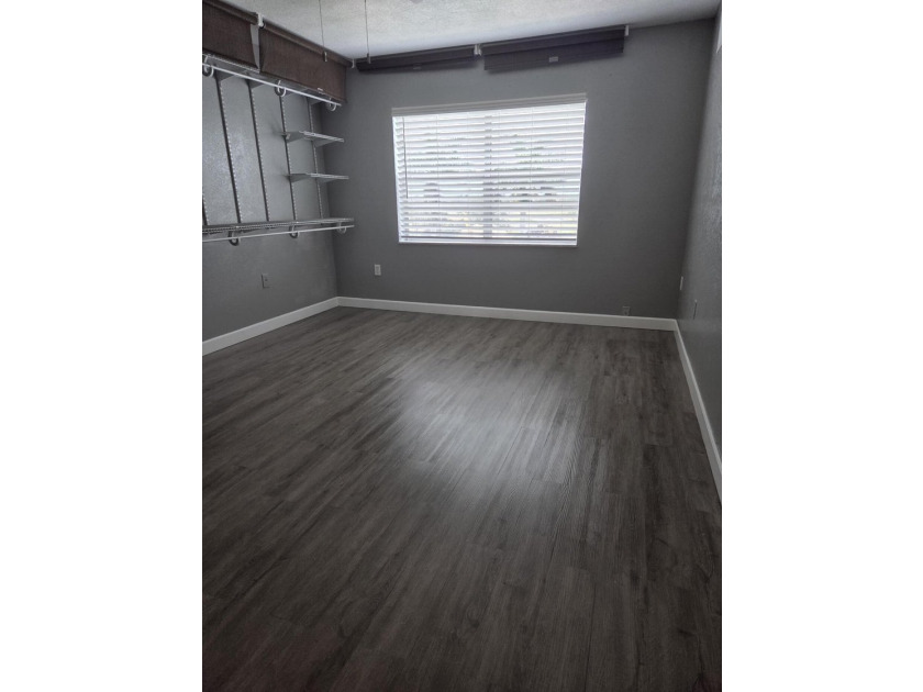 PRICE, LOCATION &amp; STYLE! Beautifully updated 55+ 1/1 condo - photo 16