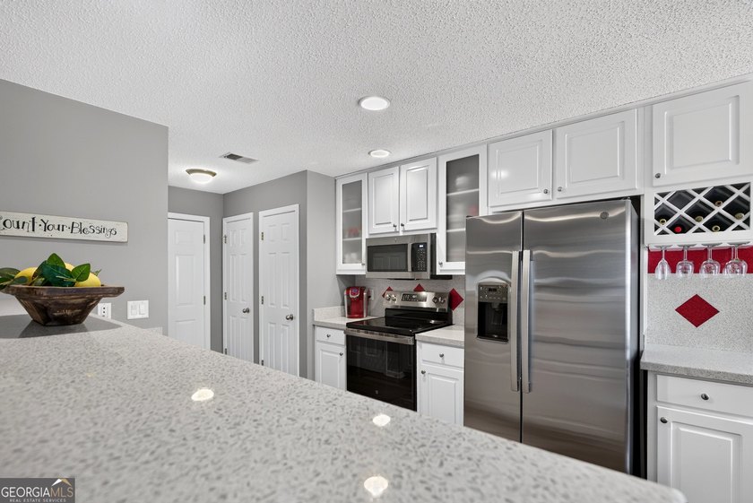 Welcome home to your own private resort in the highly sought - photo 17