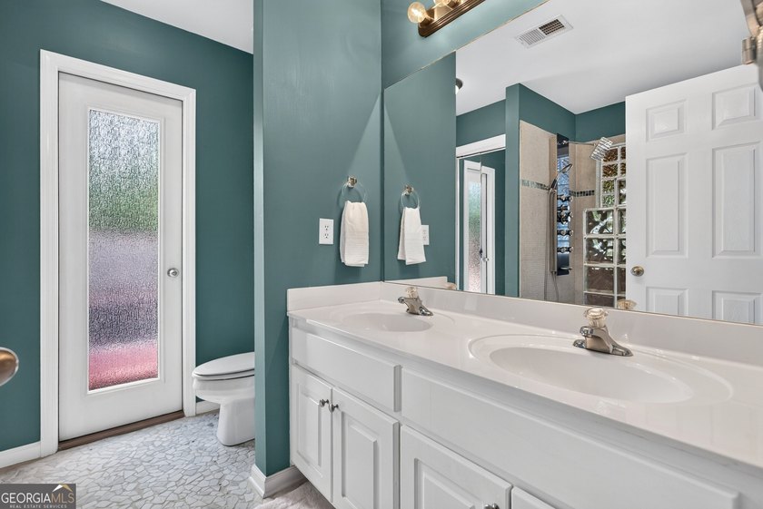 Welcome home to your own private resort in the highly sought - photo 21