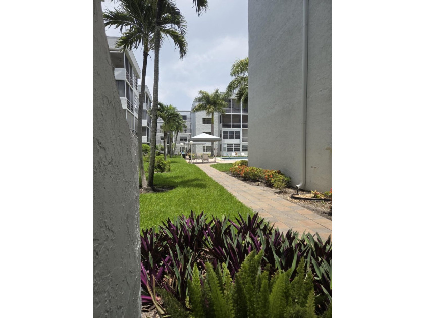 PRICE, LOCATION &amp; STYLE! Beautifully updated 55+ 1/1 condo - photo 21