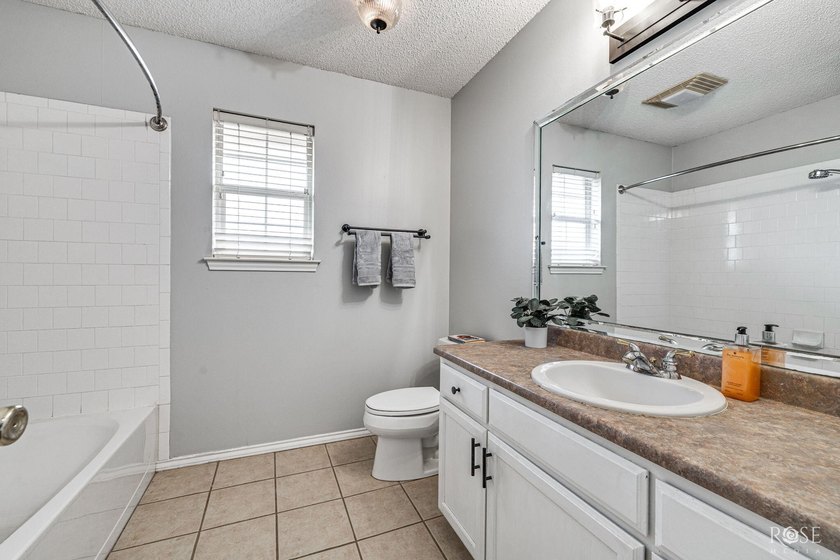 Welcome home to this well-priced 3 bedroom, 2 bath gem in - photo 21