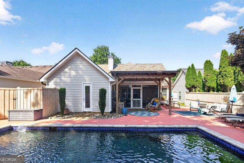 Welcome home to your own private resort in the highly sought - photo 30