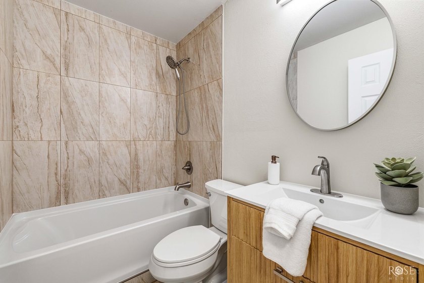 Welcome home to this beautifully updated 4-bedroom, 2-bath - photo 12