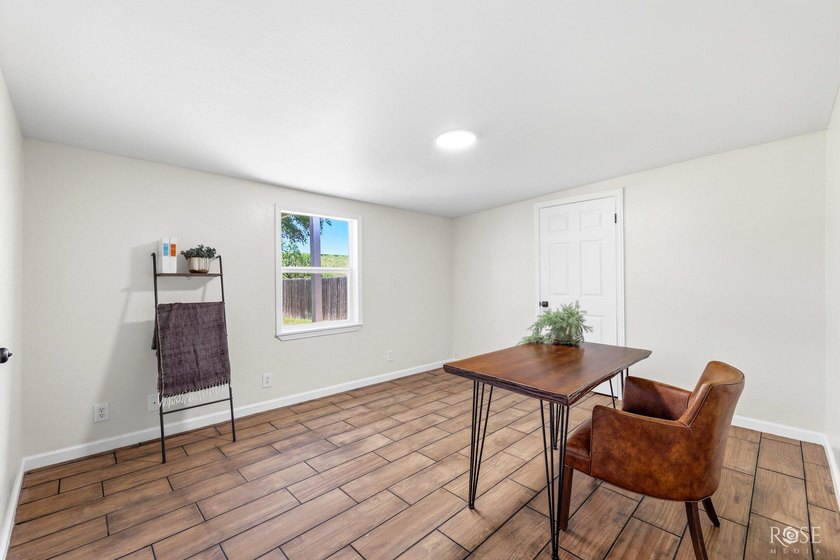 Welcome home to this beautifully updated 4-bedroom, 2-bath - photo 16
