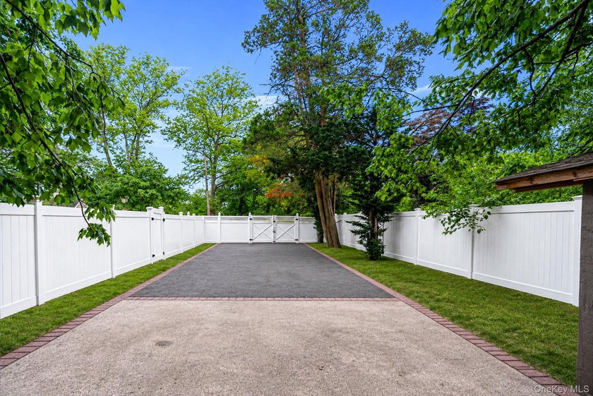 Welcome to this charming 4-bedroom, 2-bath Cape Cod situated on - photo 8