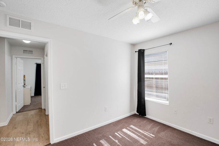 Welcome to this charming 4-bedroom, 2-bathroom home offering - photo 12