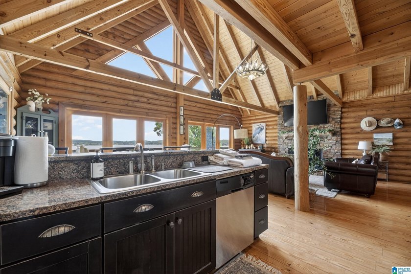 Experience refined lakefront living in this exceptional log - photo 14